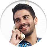 Smiling man talking on the phone